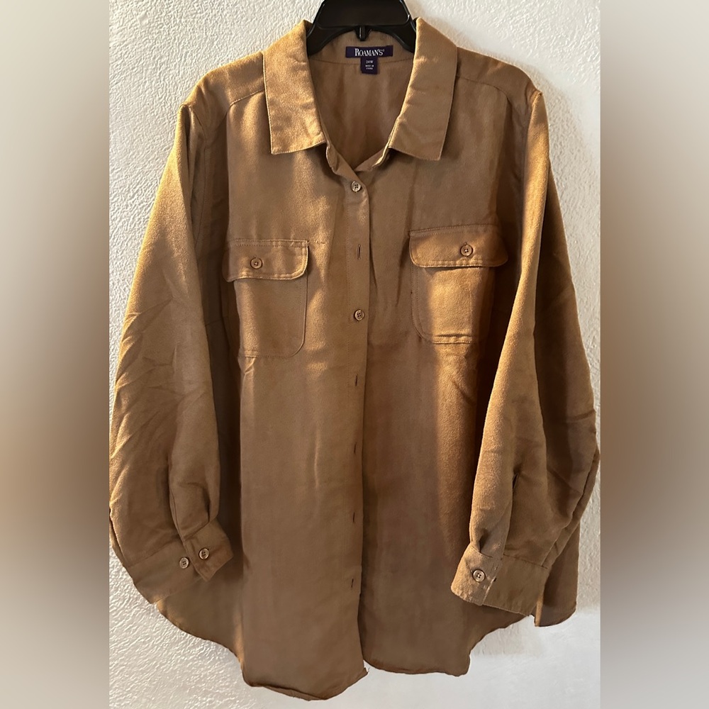 A Very Comfortable Top that’s layered with 
an over Long Sleeve Shirt.